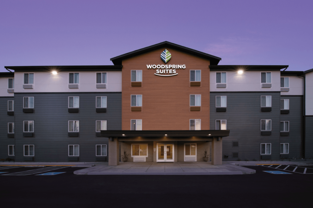 WoodSpring Suites exterior, one of the Choice Hotels brands where Choice Privileges points can be earned and redeemed