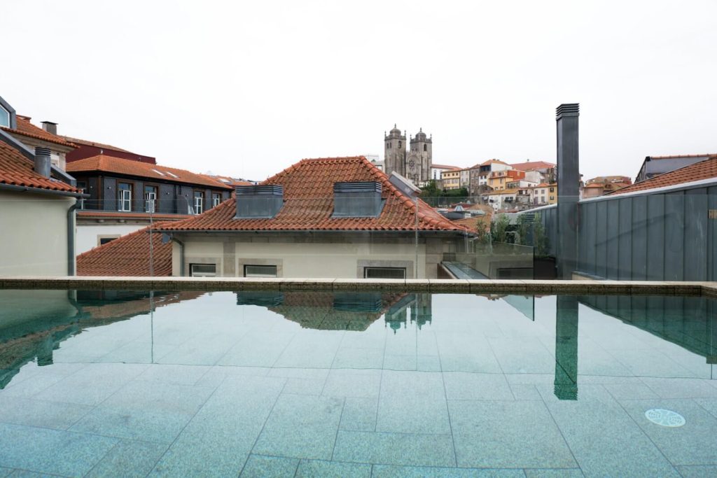 Marriott Platinum Soft Landing: Can You Drop to Gold? 5 Hotel rooftop pool overlooking a historic city skyline
