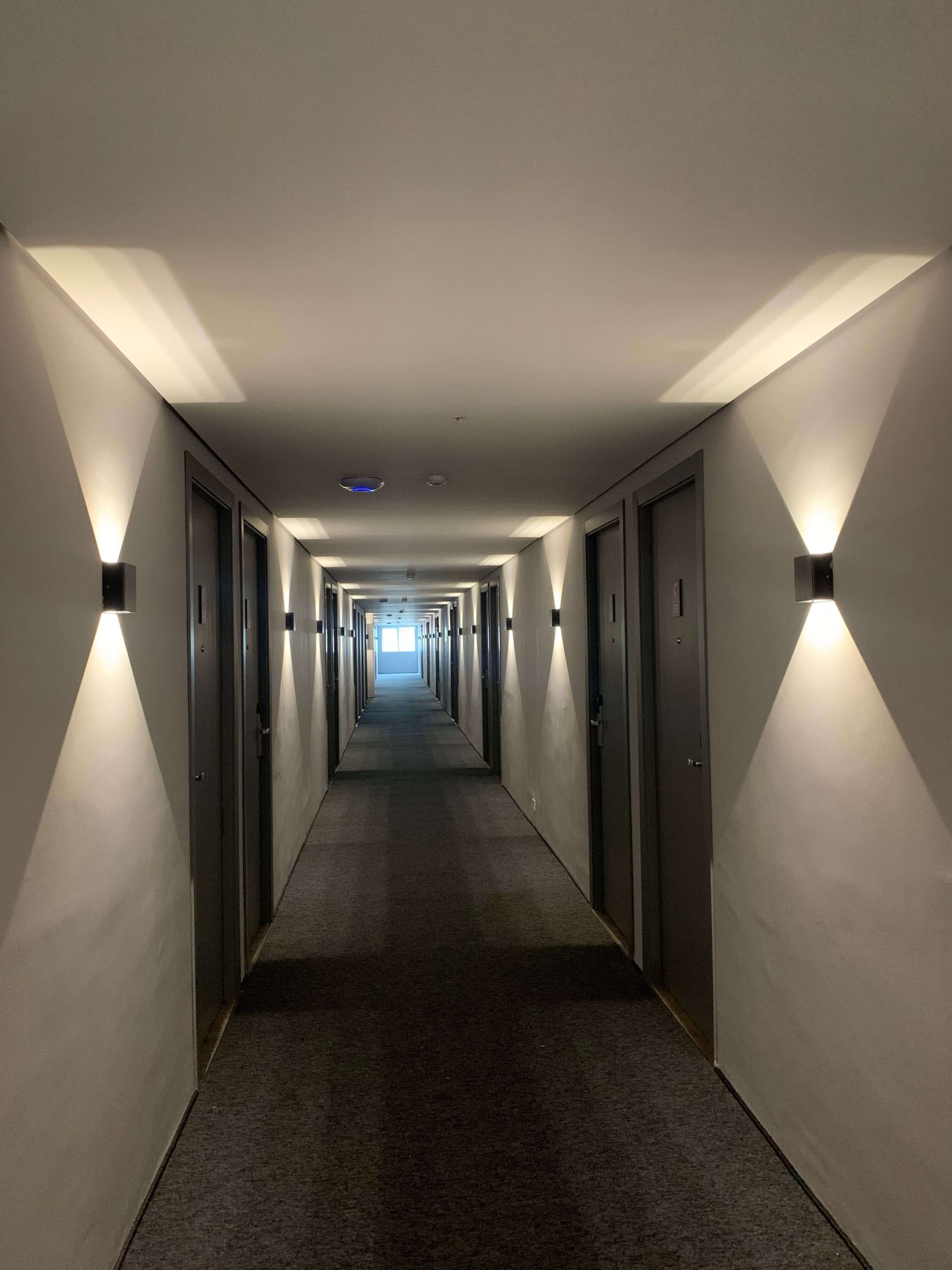 Modern hotel hallway with doors