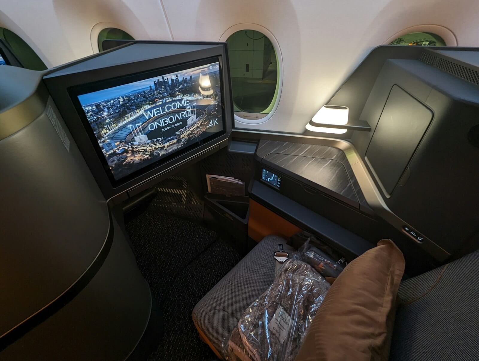 Delta Complimentary Upgrades for Companions: How It Actually Works 34 Premium cabin suite seat, the kind of upgrade a Medallion member and companion could clear into