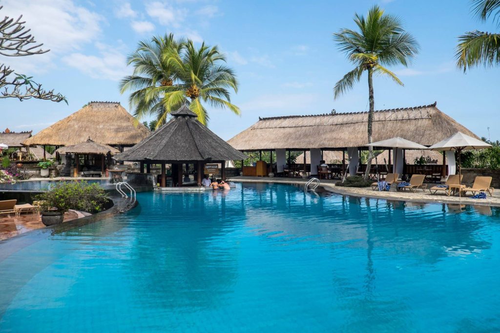 Wyndham Rewards Expands to a Four-Tier Award Chart, Adds 45,000-Point Ceiling 14 Tropical resort pool with thatched-roof cabanas