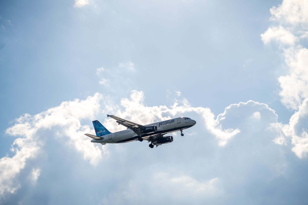 JetBlue Airbus A320 climbing through clouds