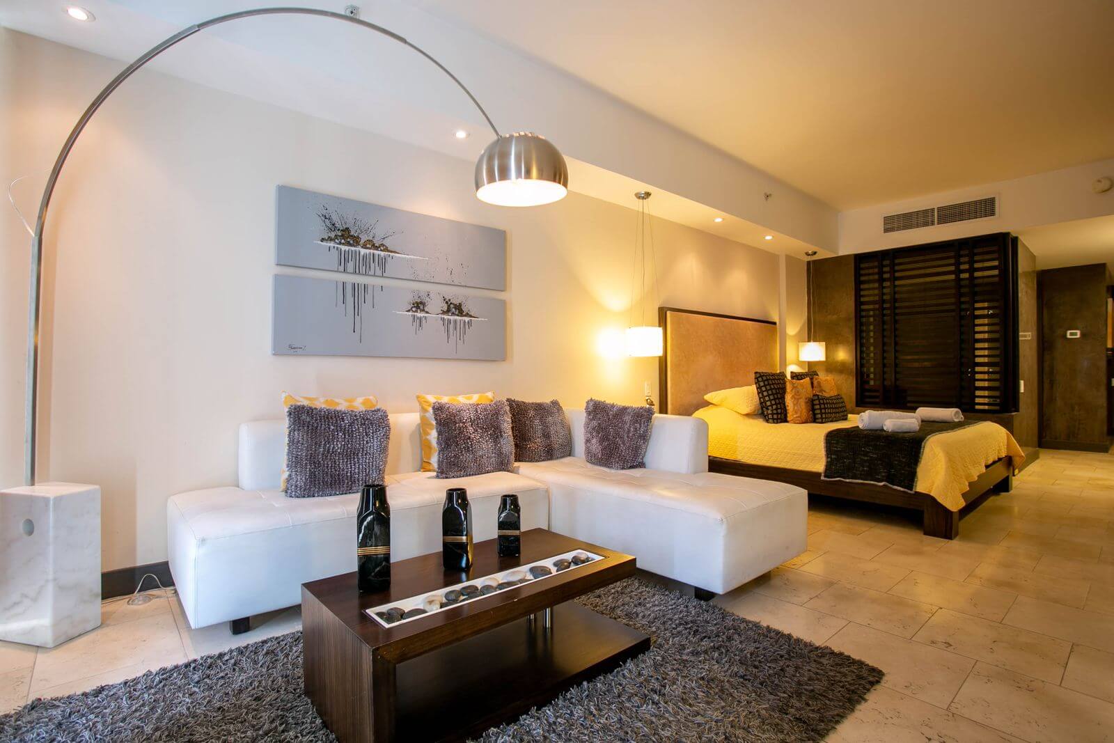Marriott Is Testing a New Upgrade Waitlist That Ranks Elite Members 1 Modern hotel suite with living area and bedroom