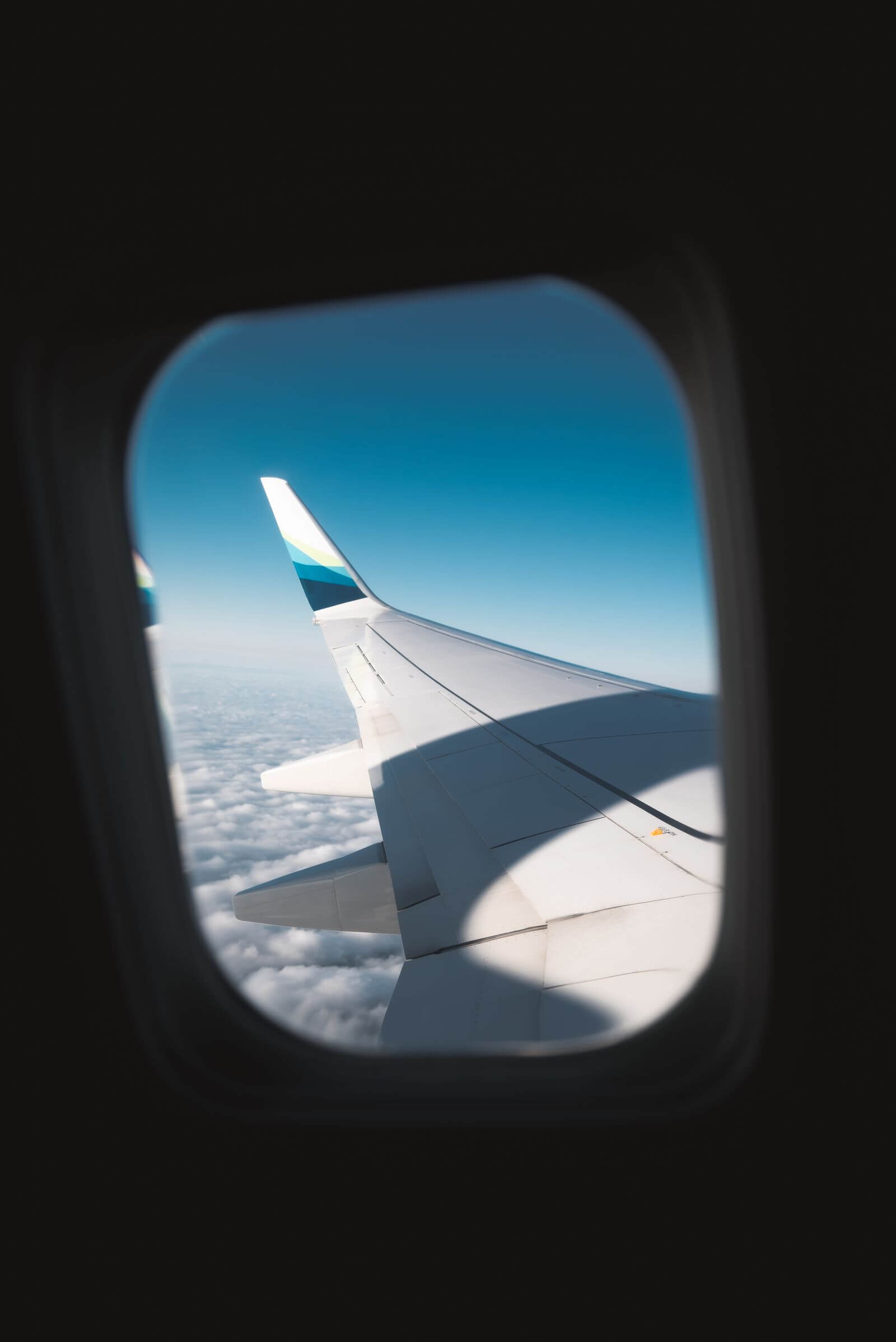United Gateway Card (With No Annual Fee) Review 6 View of an airplane wing from a window seat above the clouds